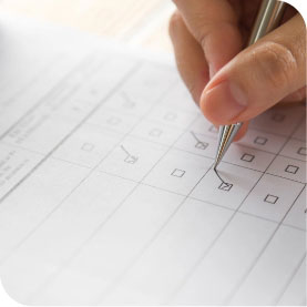 Compton Family Dental person filling out a form